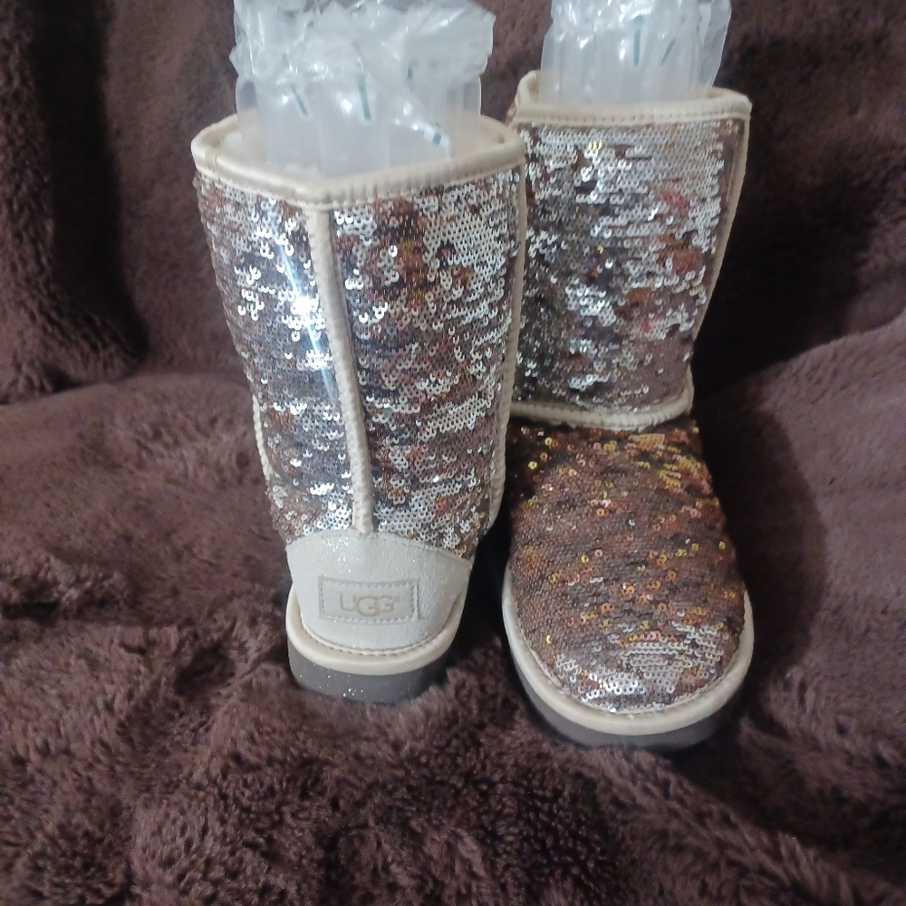 New out tags sequins UGG warn and beautiful boots. Never used I was in my closet